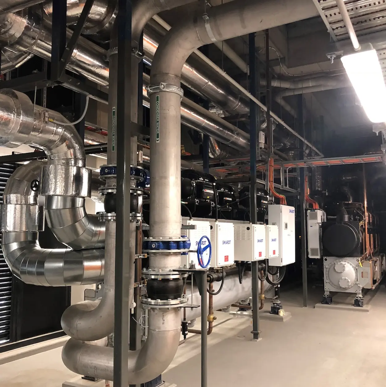 Inside the HIB building with a HVAC piping system installed by Industrial Medical Piping Systems.